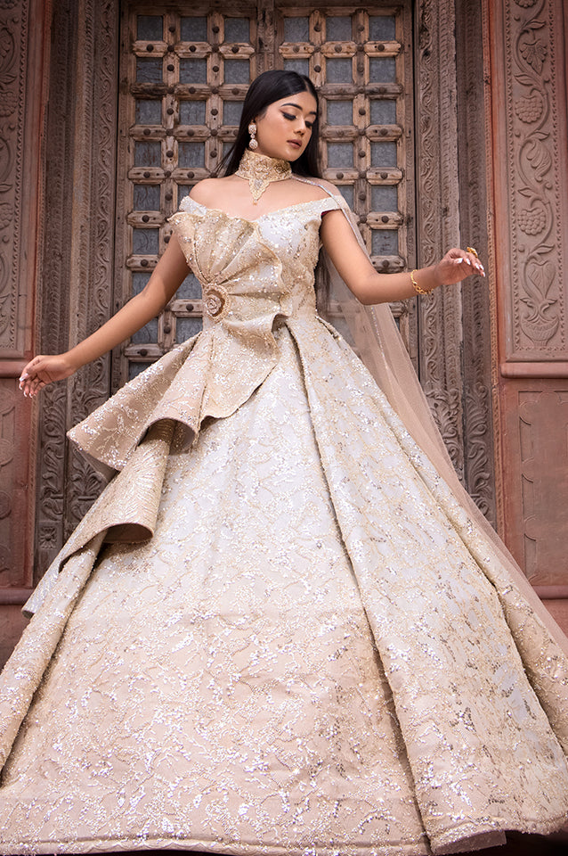 Champagne gold corseted ball gown ( OM 124 )