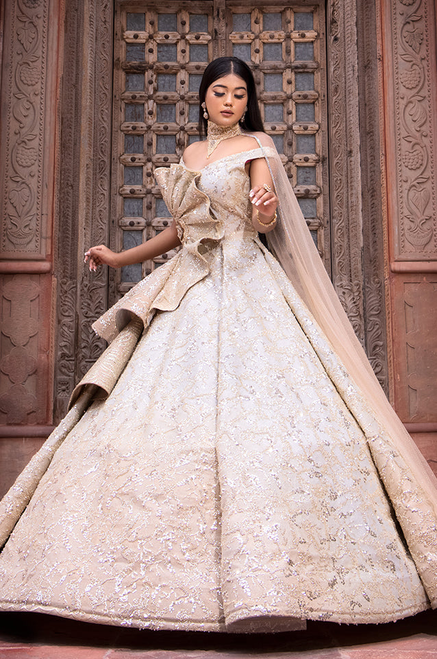 Champagne gold corseted ball gown ( OM 124 )