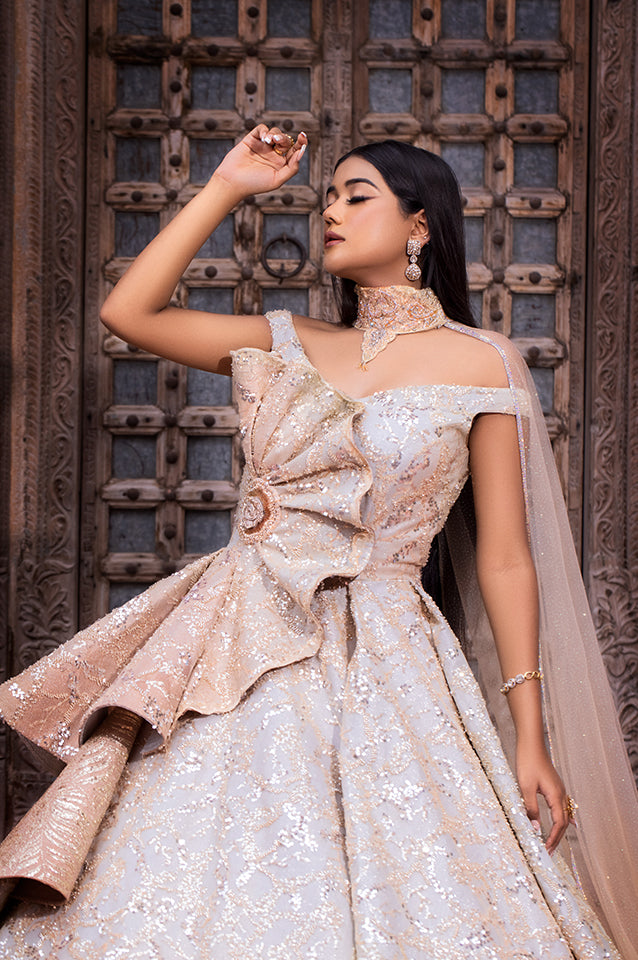 Champagne gold corseted ball gown ( OM 124 )